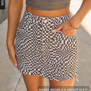 NWT. Vici Black and White Optical Mini Skirt